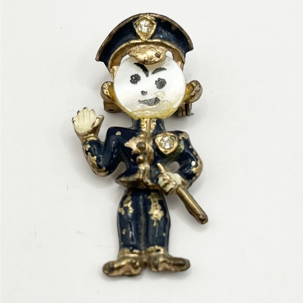 Estate enamel shell articulating Policeman brooch pin
